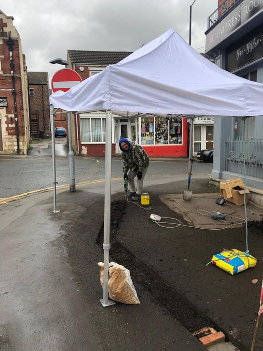 outdoor gazebo used as shelter for labourer