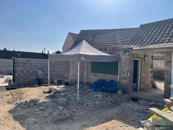 outdoor gazebo used as shelter for labourer