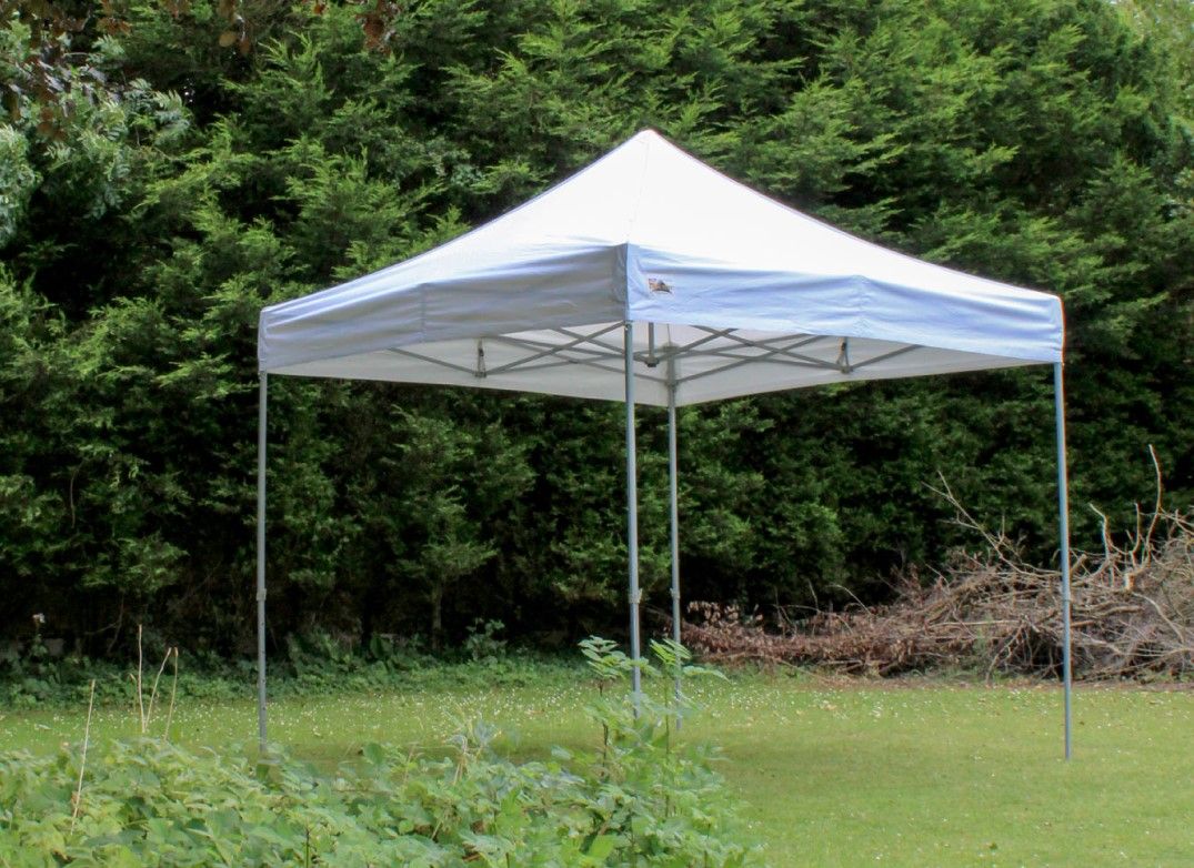 A white gazebo erected in a garden