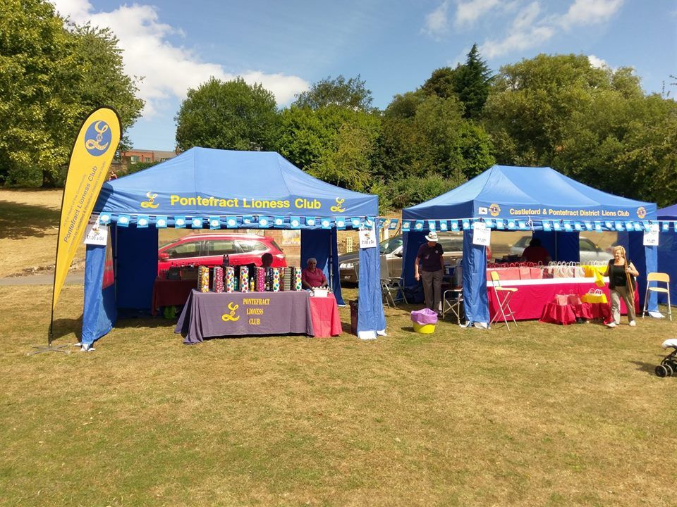 A custom printed business gazebo set up outside