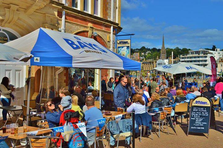 Beer garden gazebo over tables and chairs