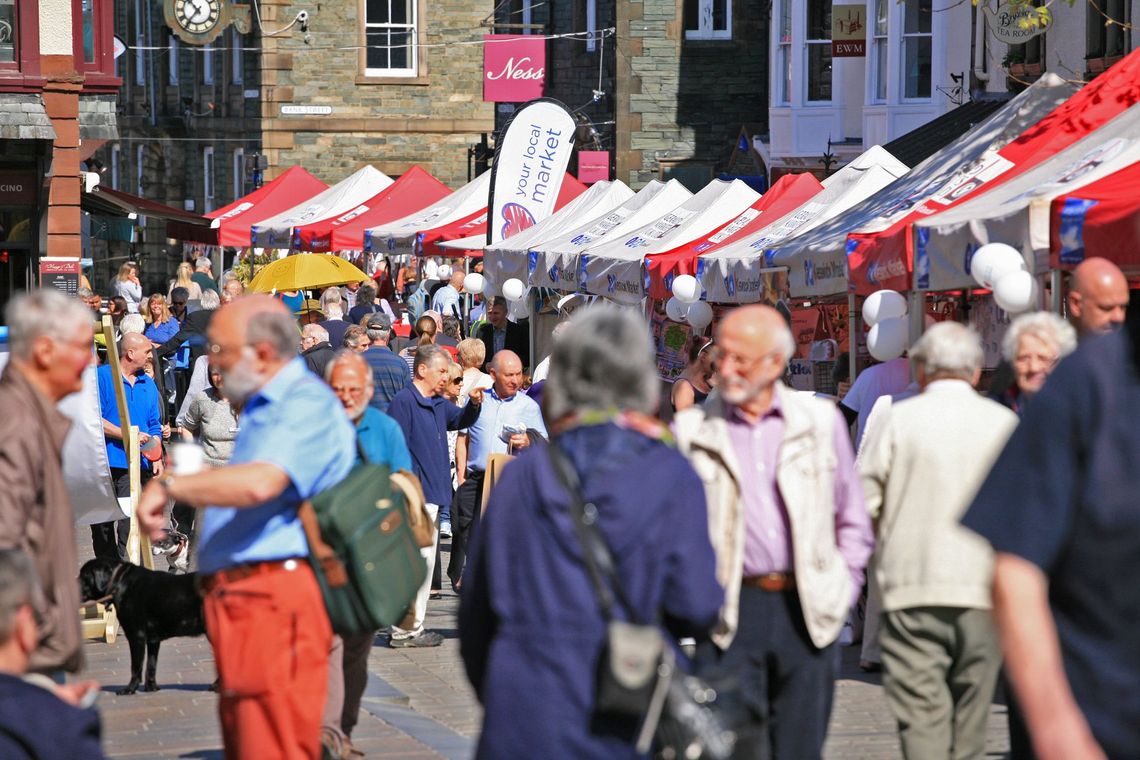 A row of gazebos being used as trade stalls