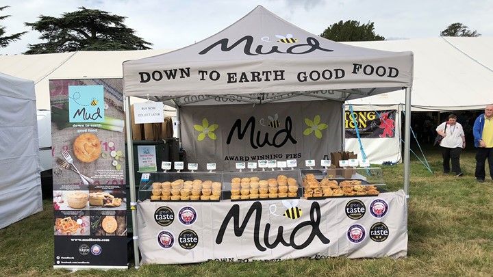 A gazebo with custom printed branding for a streetfood vendor