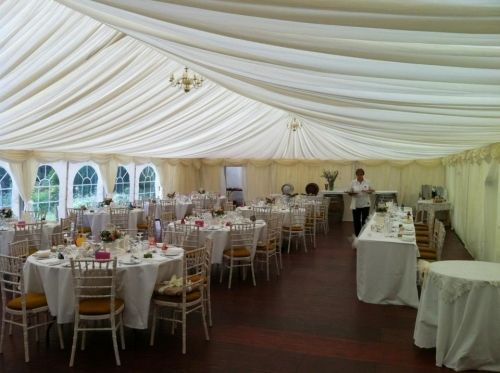 Gala Tent Marquee Wedding with lining and decorative tables and chairs