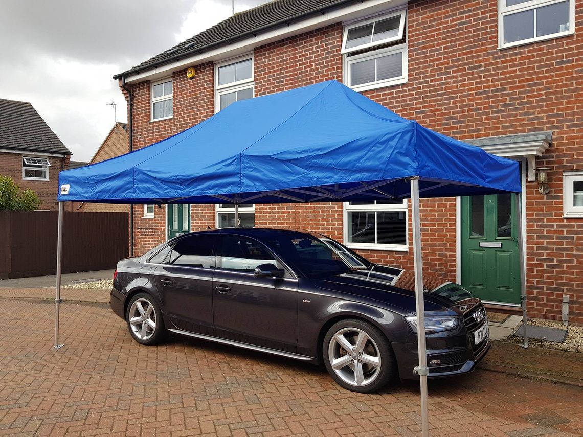 Gala Shade Pop Up Gazebo sheltering a car on a driveway