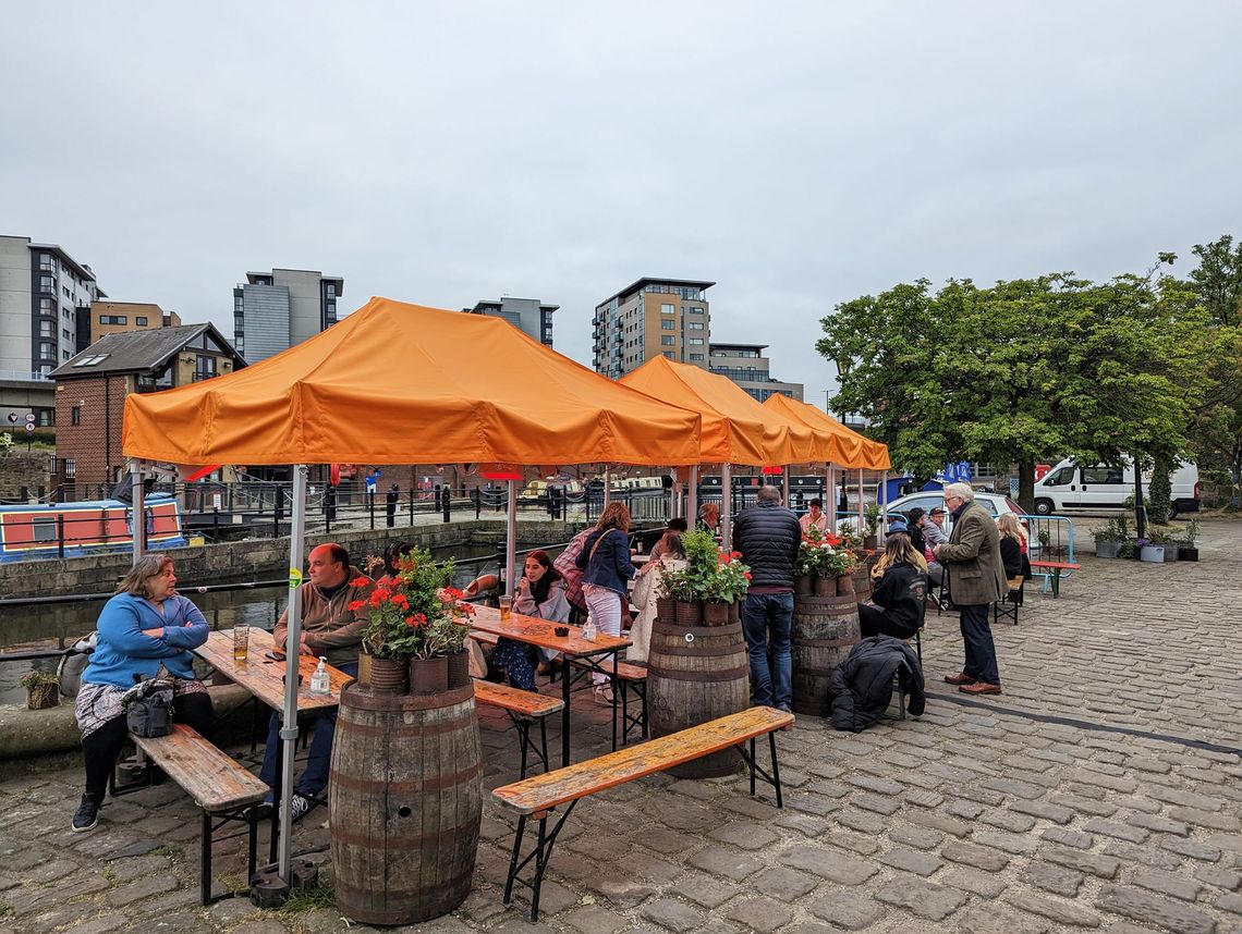 Orange gazebo at an outdoor event