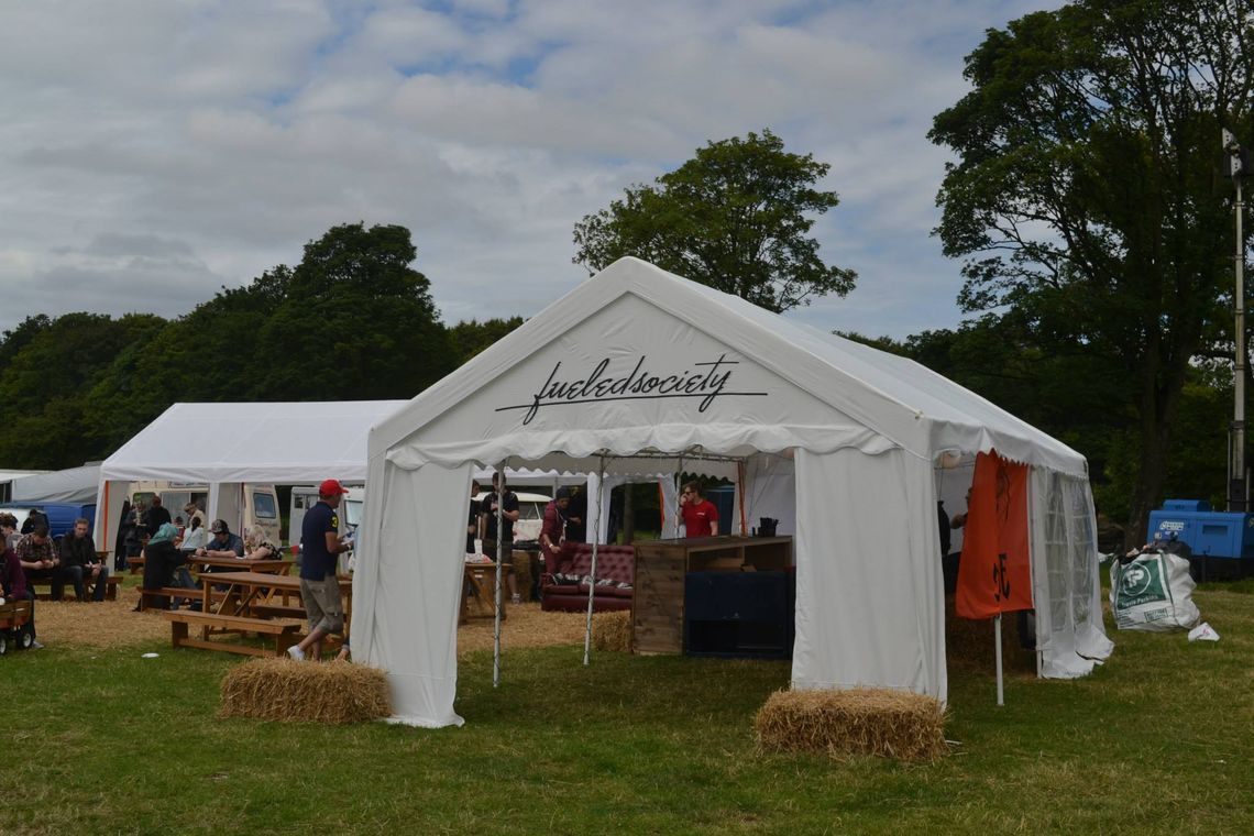 A branded marquee at a festival