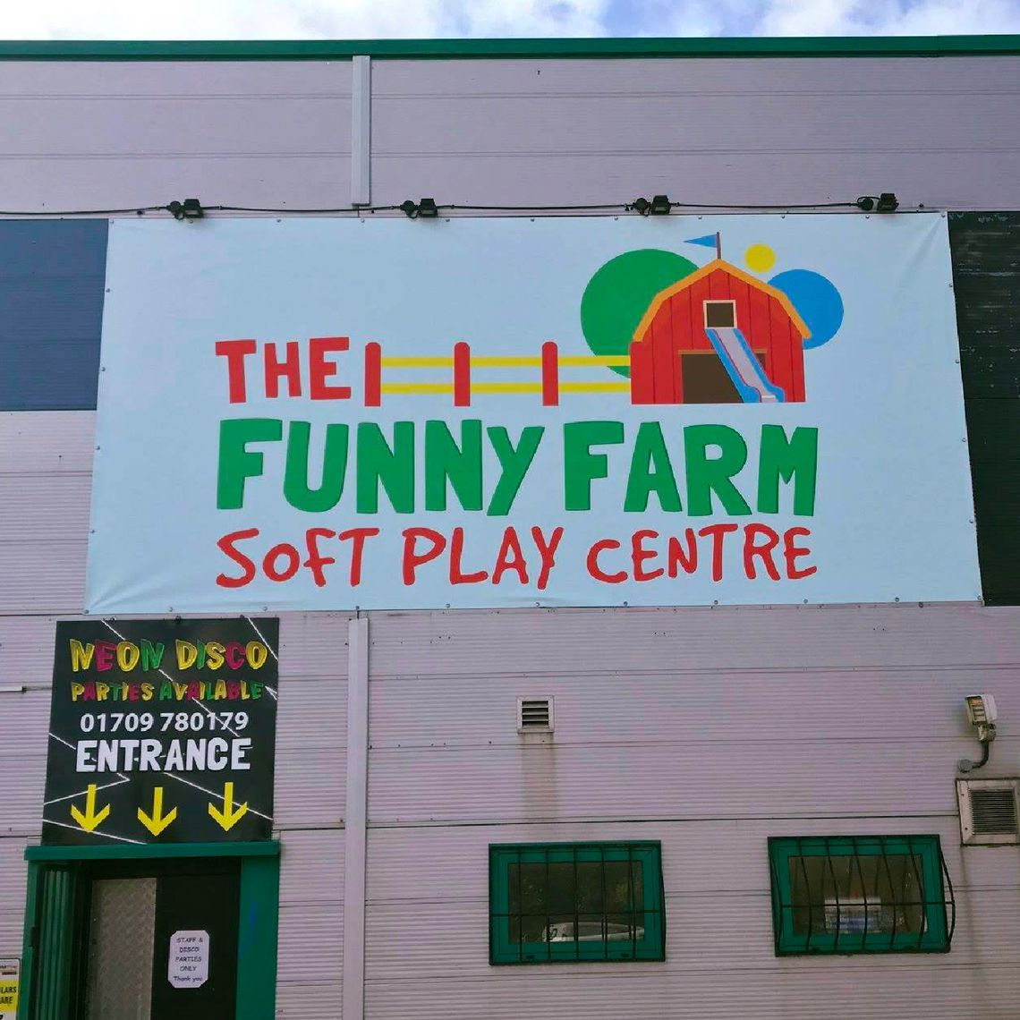 A large bright banner outside a soft play area