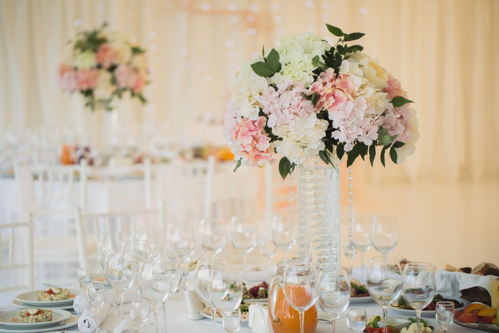 Beautiful flowers on a table in a wedding marquee