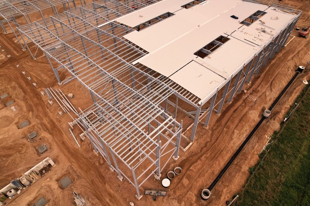 Overhead shot of a warehouse building framework being erected