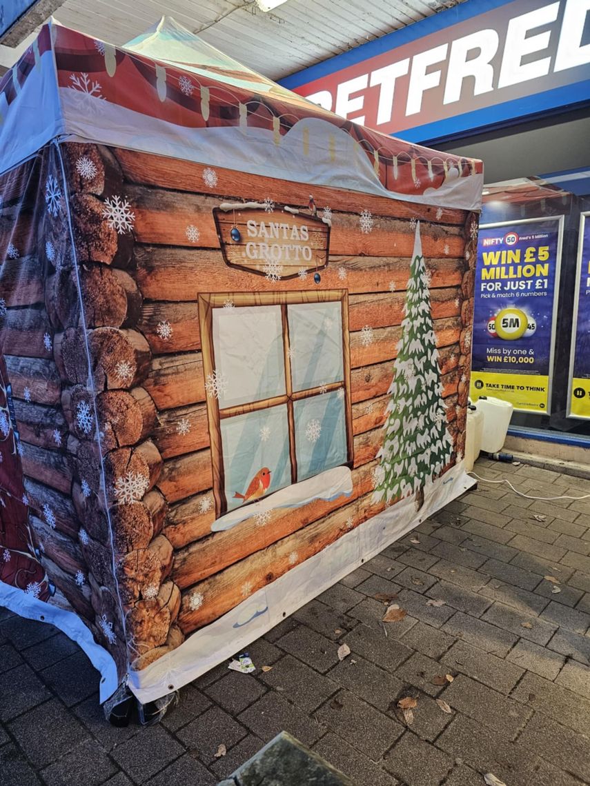 Another angle of a santa's grotto in a town