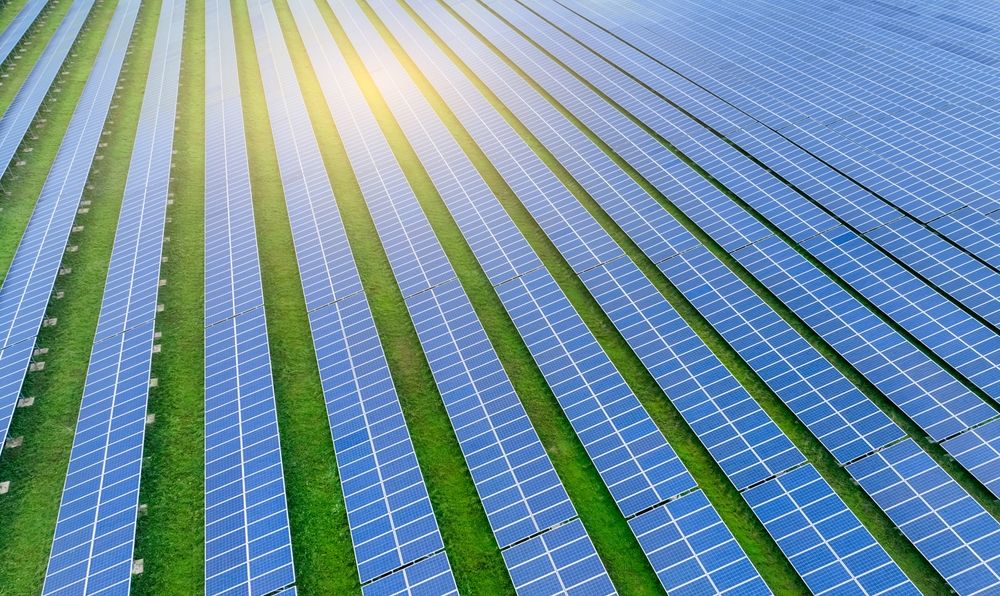 A series of solar panels on a farm