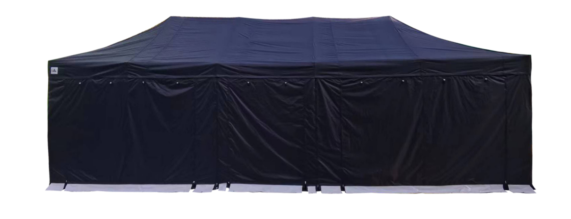 A large pop up gazebo with black canopy and sidewalls