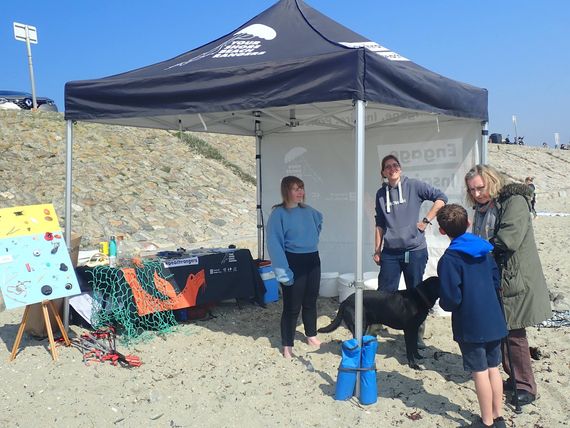 sports gazebo on beach with recycling station