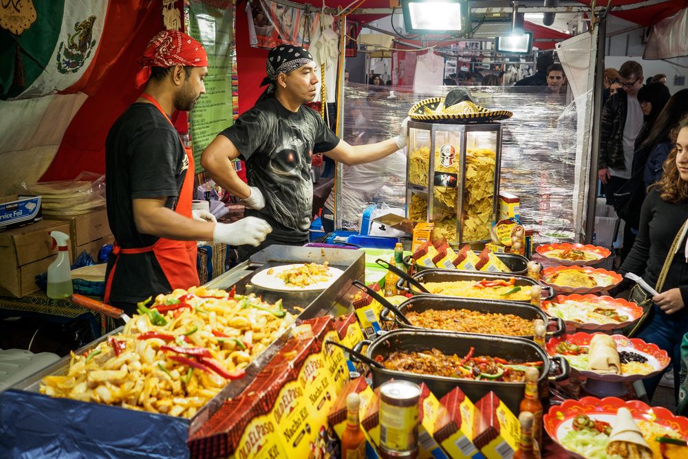 A vibrant mexican street food stall